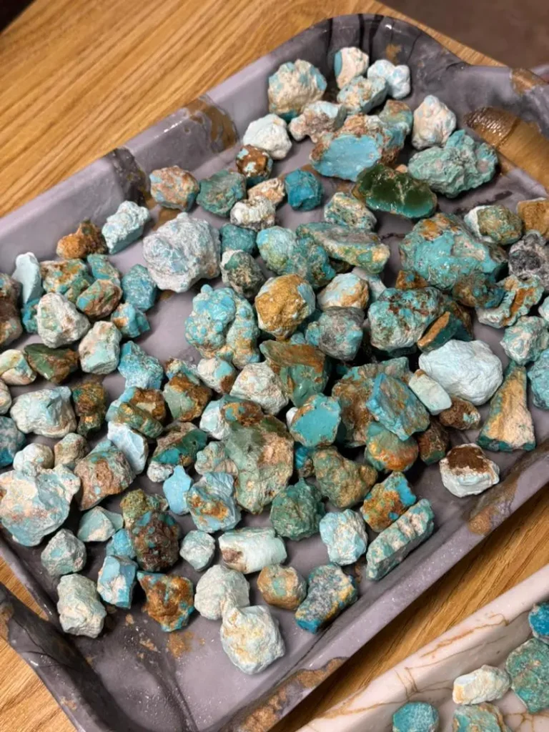 Large volume of raw Armenian turquoise chips in sky-blue color, available for wholesale